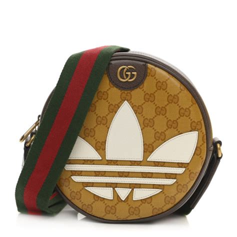 gucci adidas round bag|gucci adidas jumpsuit.